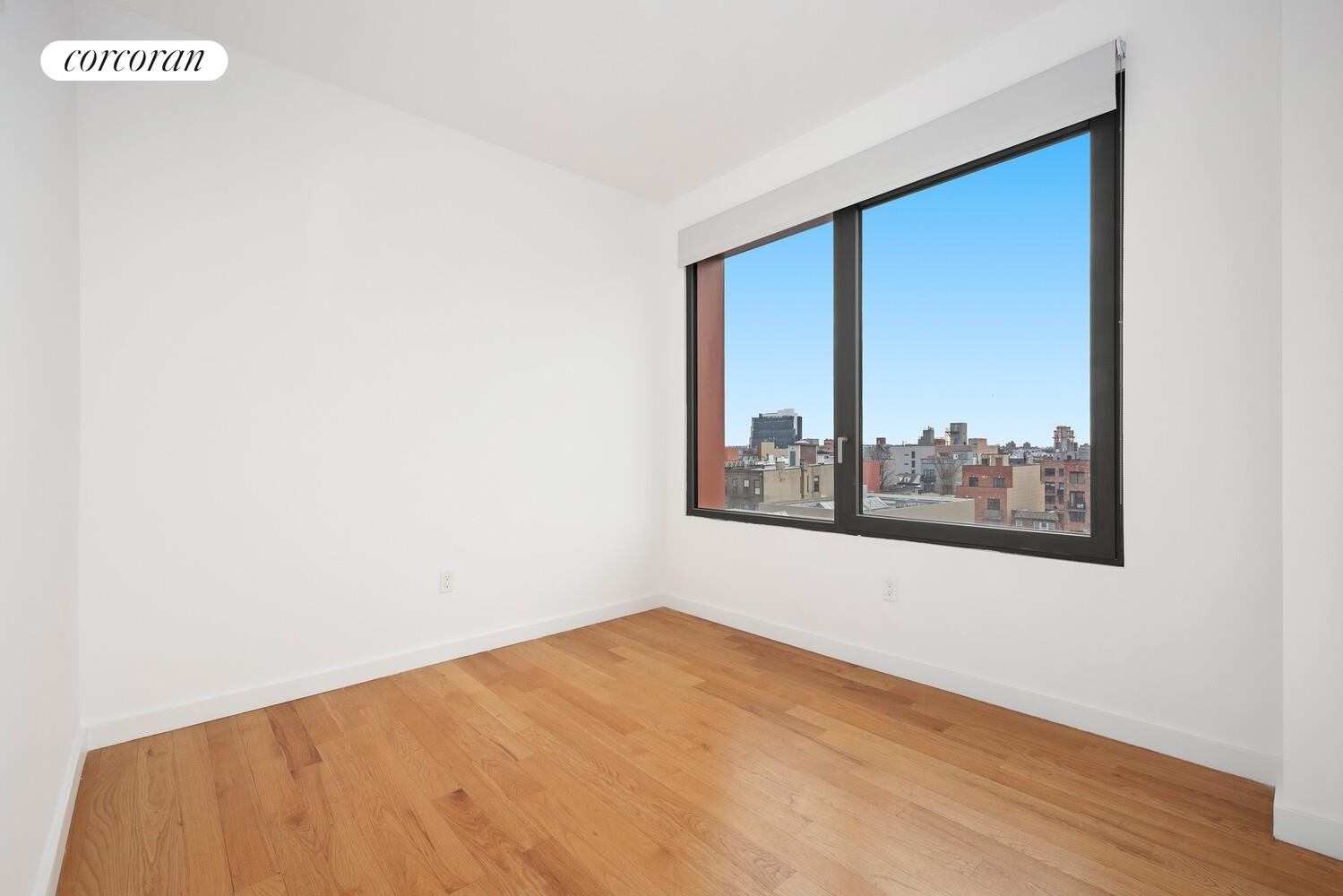 54 Noll Street, Unit 715 Brooklyn, NY 11206 - Photo 9 of 28 an empty room with a window