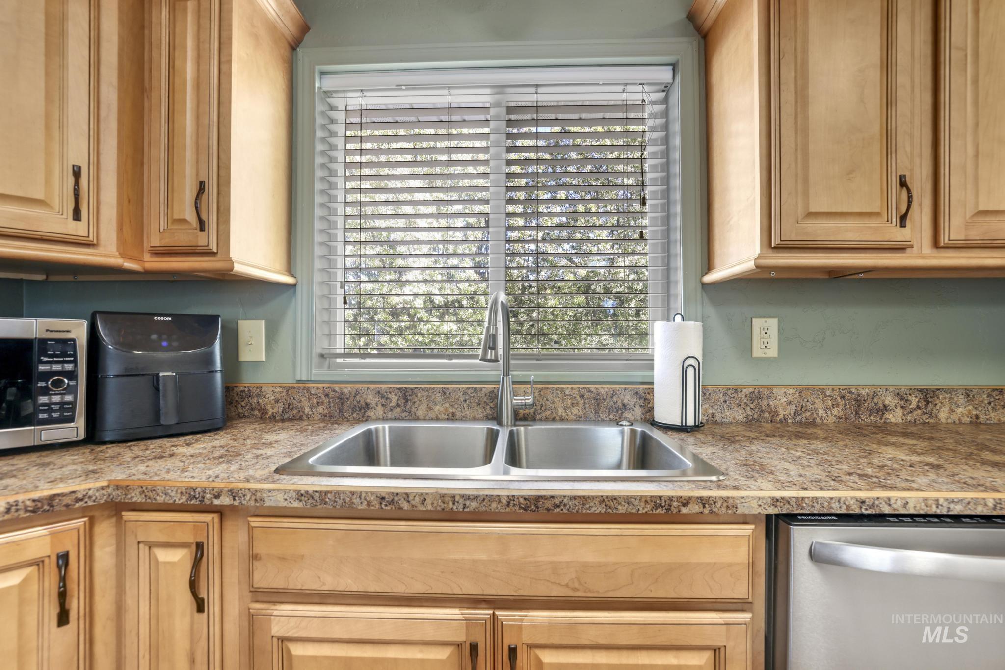 309 North Grape Street Shoshone, ID 83352 - Photo 7 of 26 Kitchen with stainless steel appliances and plenty of natural light
