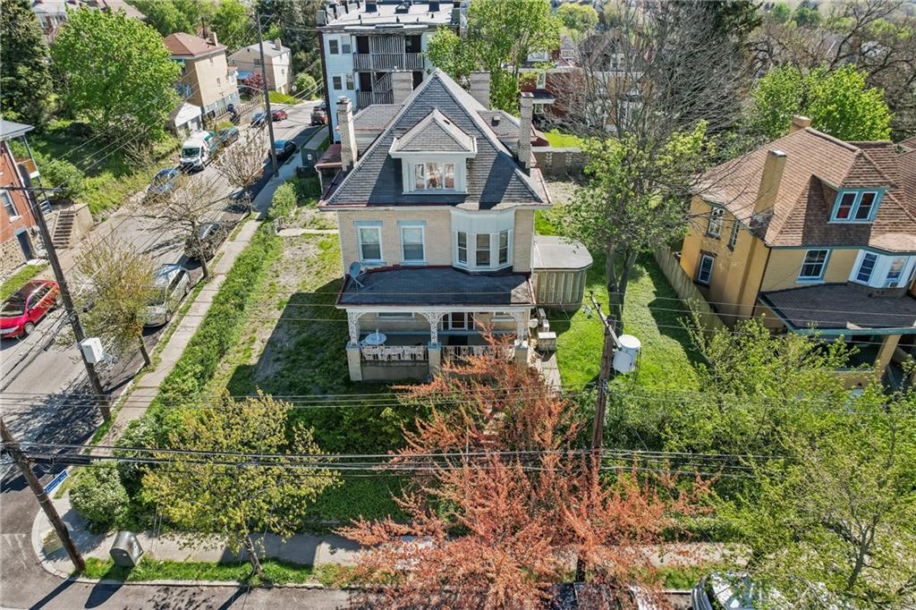 1503 Beechview Avenue Pittsburgh, PA 15216 - Photo 2 of 26 an aerial view of a house with a yard