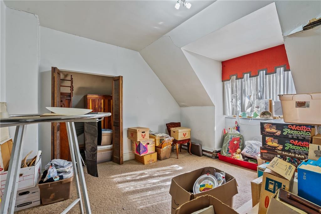 1503 Beechview Avenue Pittsburgh, PA 15216 - Photo 23 of 27 a room with furniture and a flat screen tv