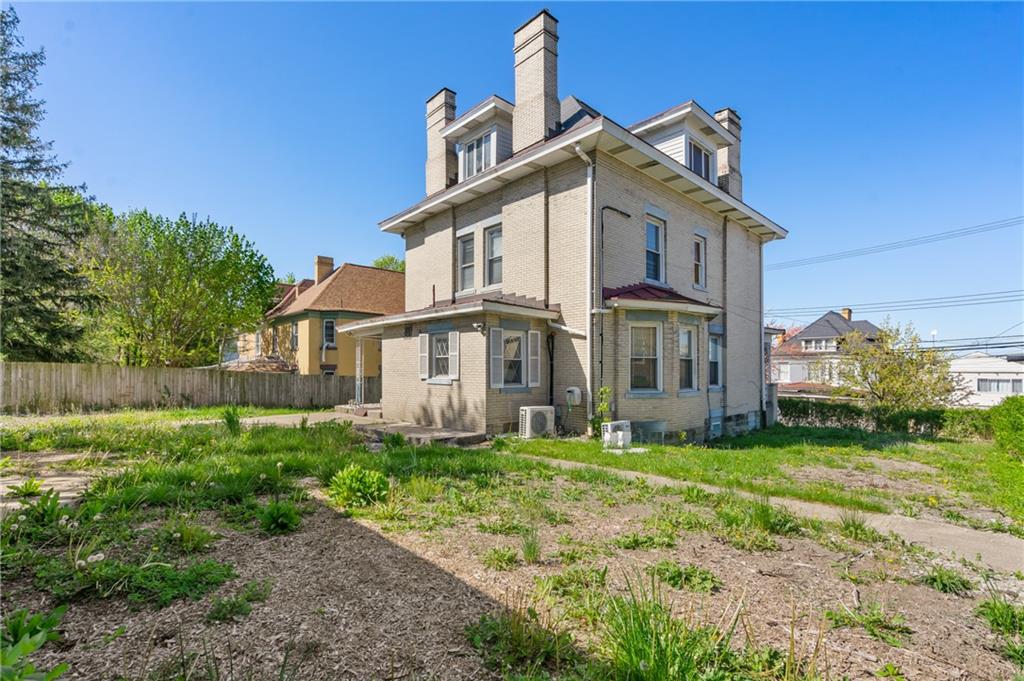 1503 Beechview Avenue Pittsburgh, PA 15216 - Photo 25 of 27 a view of a house with a yard