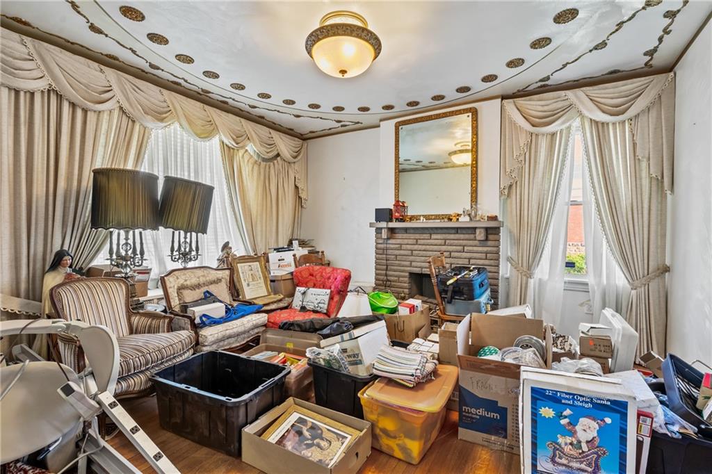 1503 Beechview Avenue Pittsburgh, PA 15216 - Photo 7 of 26 a living room with furniture and a flat screen tv