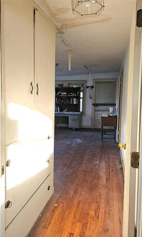 a view of a living room and bathroom