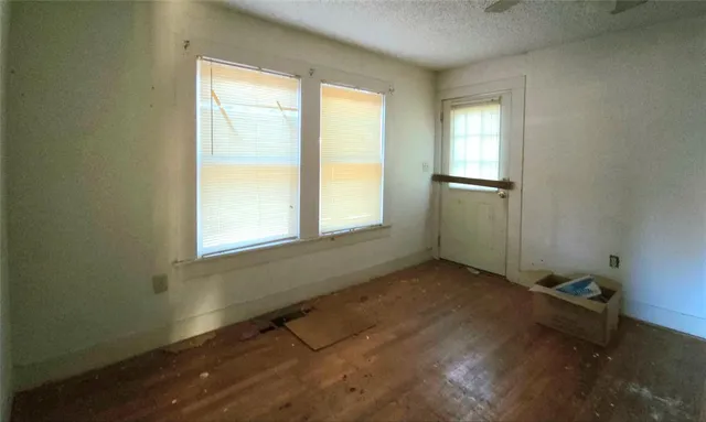 an empty room with windows