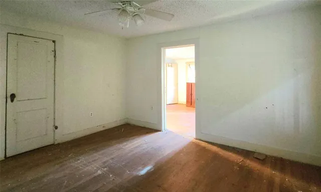 an empty room with a empty space and a window