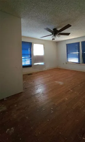 a view of a room with a sink and a window