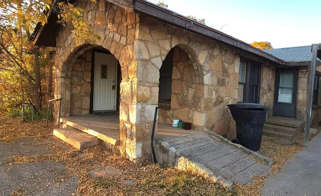 a view of entrance gate of a house