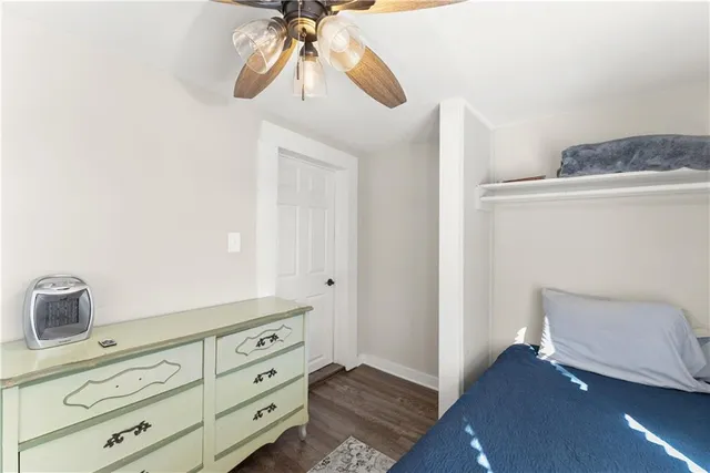 a view of storage and utility room with closet