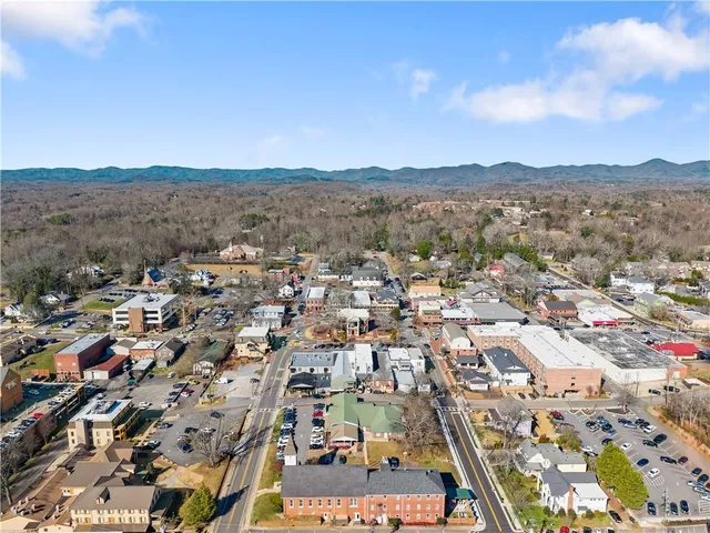 an aerial view of residential house and outdoor space