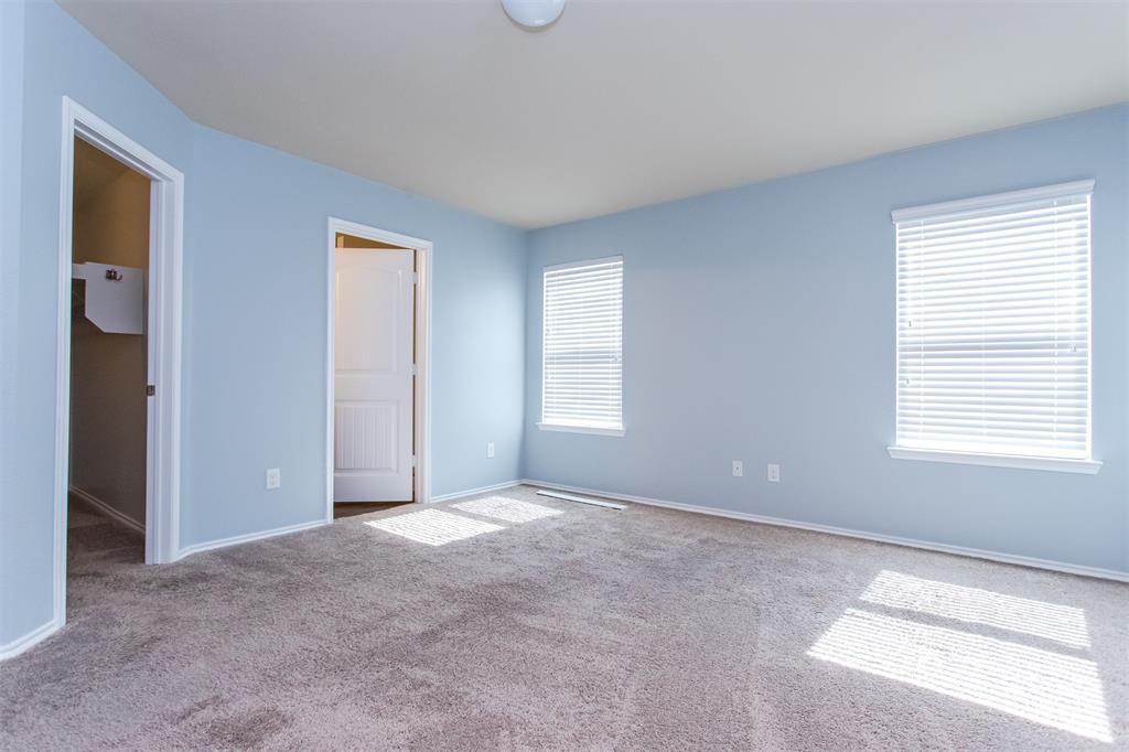 2103 Meadow Park Drive Princeton, TX 75407 - Photo 11 of 30 a view of an empty room with a window