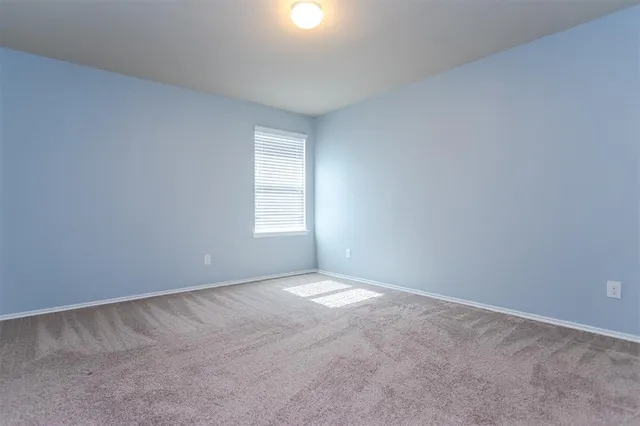 a view of empty room with window