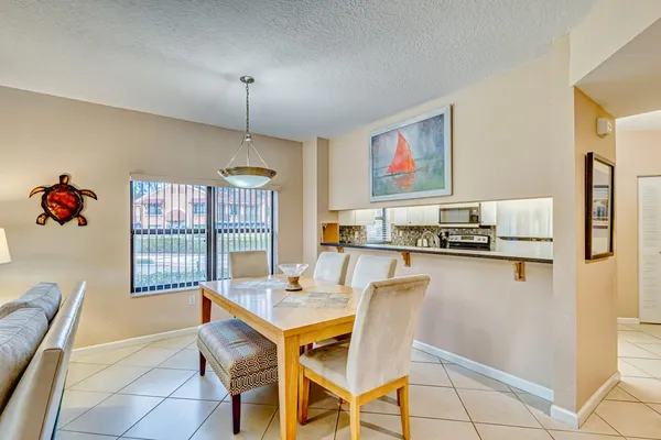 $3,000 | 200 Uno Lago Drive, Unit 105, Juno Beach, FL 33408