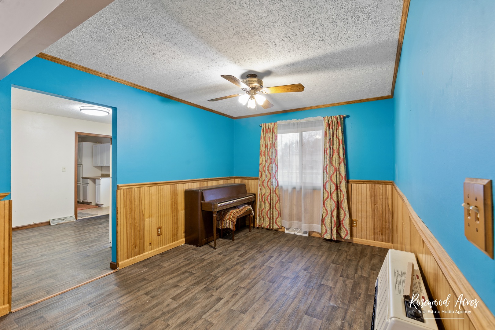 209 West Indiana Street Momence, IL 60954 - Photo 11 of 34 wooden floor in an empty room with a window