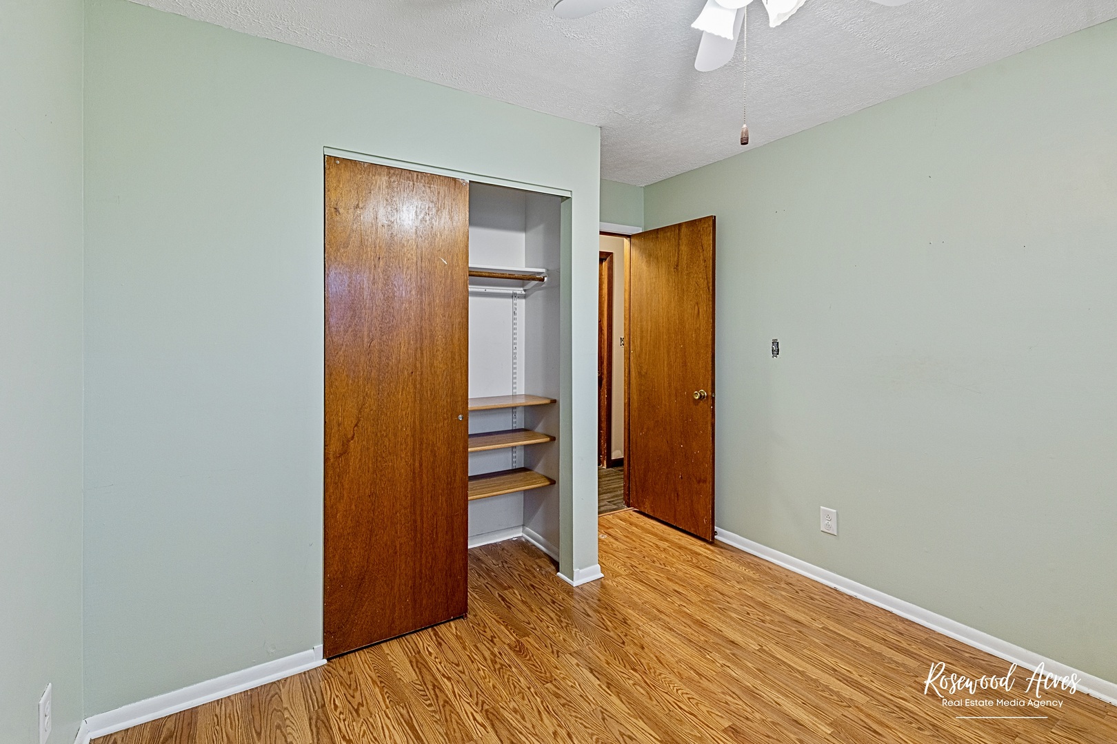 209 West Indiana Street Momence, IL 60954 - Photo 17 of 34 an empty room with closet and wooden floor