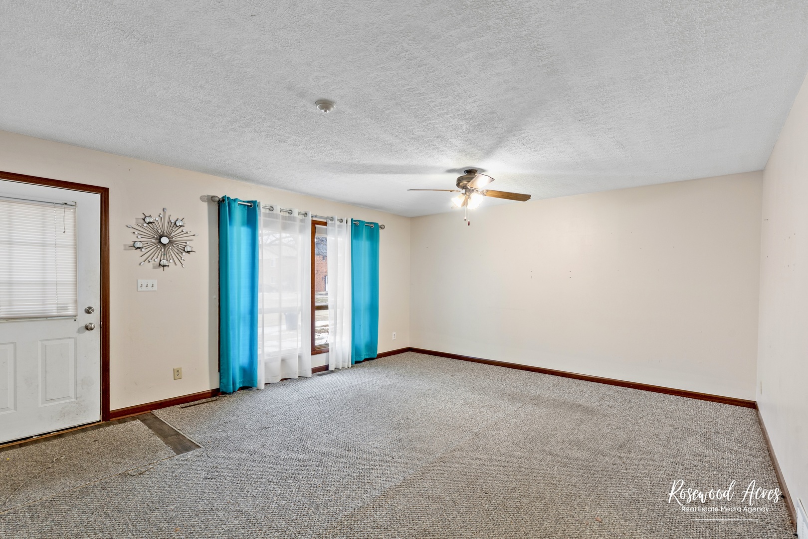 209 West Indiana Street Momence, IL 60954 - Photo 7 of 34 an empty room with chandelier fan
