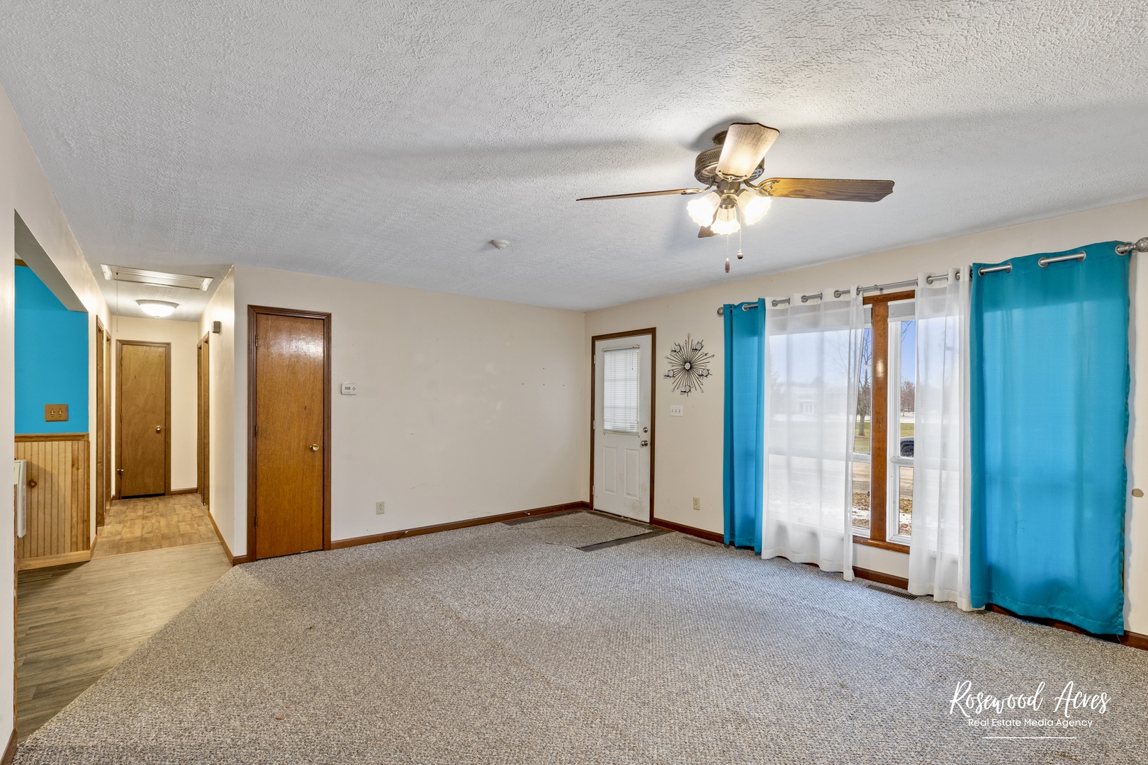 209 West Indiana Street Momence, IL 60954 - Photo 9 of 34 a view of empty room with ceiling fan