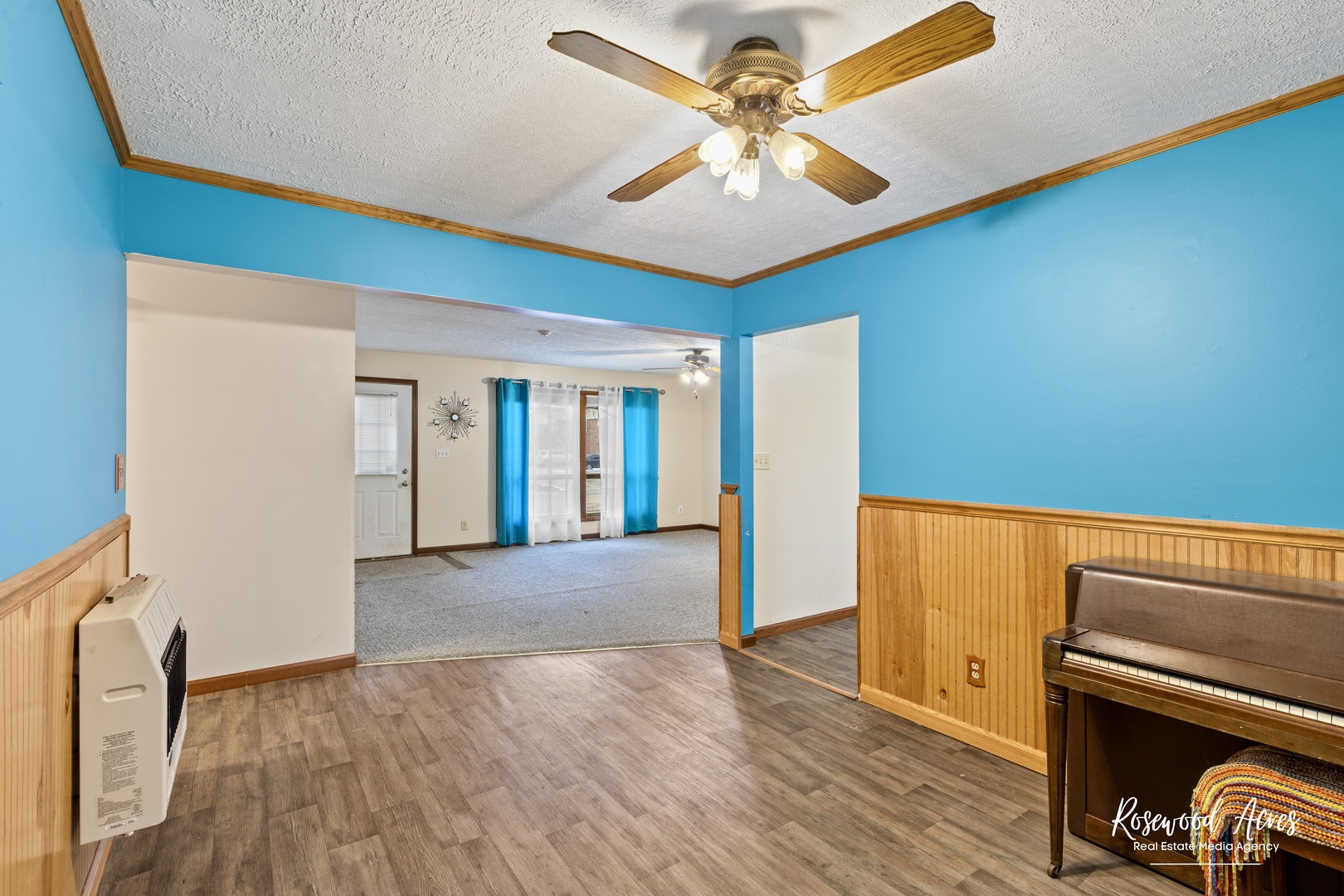 209 West Indiana Street Momence, IL 60954 - Photo 10 of 34 a view of an empty room with window and wooden floor