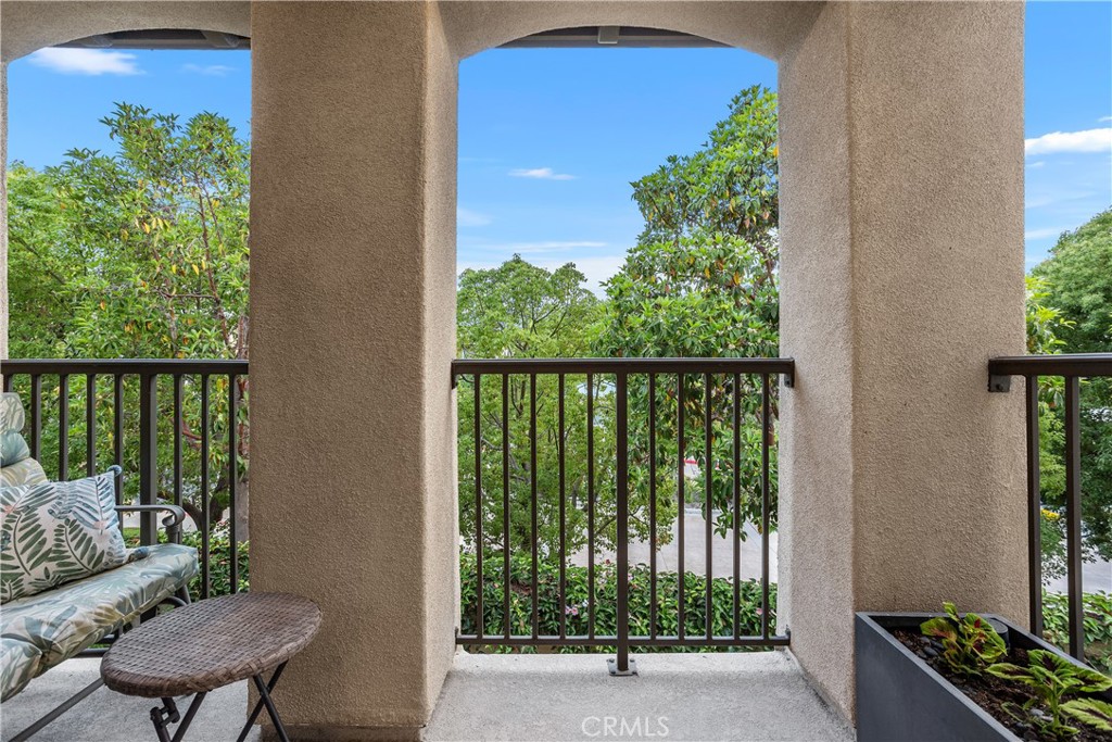 4366 Pacifica Way, Unit 7 Oceanside, CA 92056 - Photo 13 of 36 a view of a balcony with wooden floor
