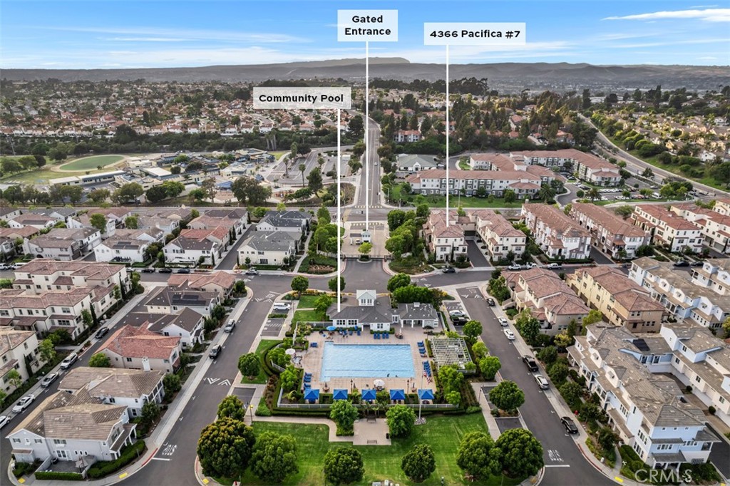 4366 Pacifica Way, Unit 7 Oceanside, CA 92056 - Photo 28 of 36 an aerial view of residential building and lake