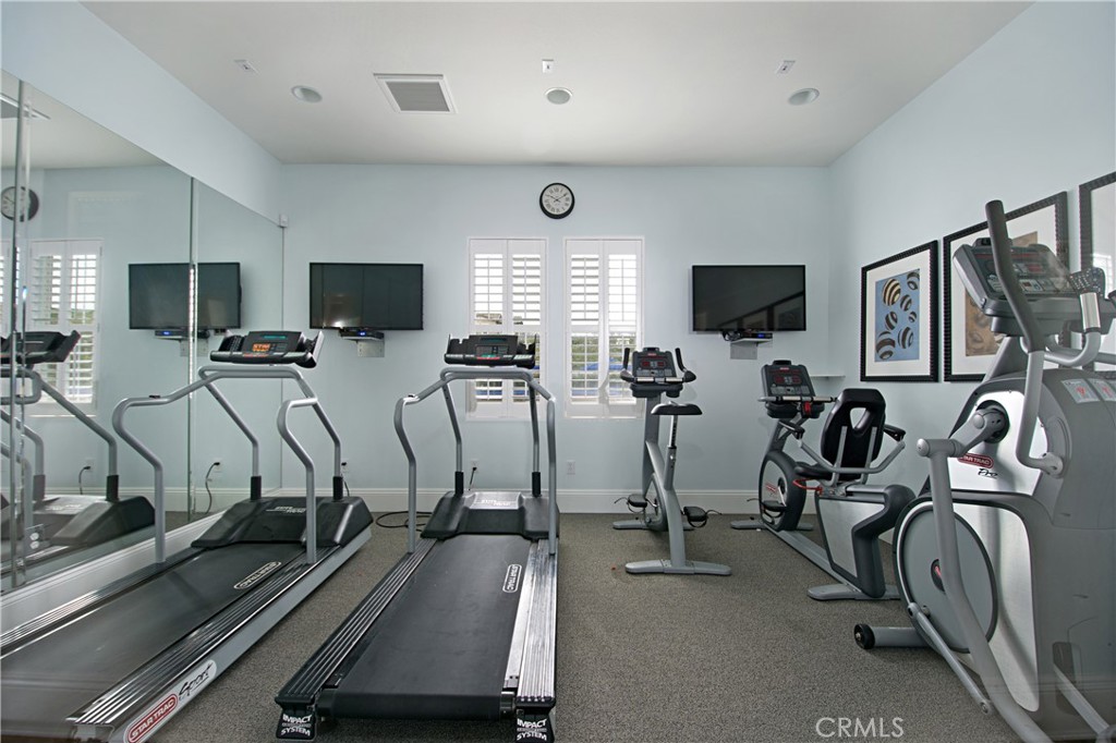 4366 Pacifica Way, Unit 7 Oceanside, CA 92056 - Photo 30 of 36 a view of a room with gym equipment