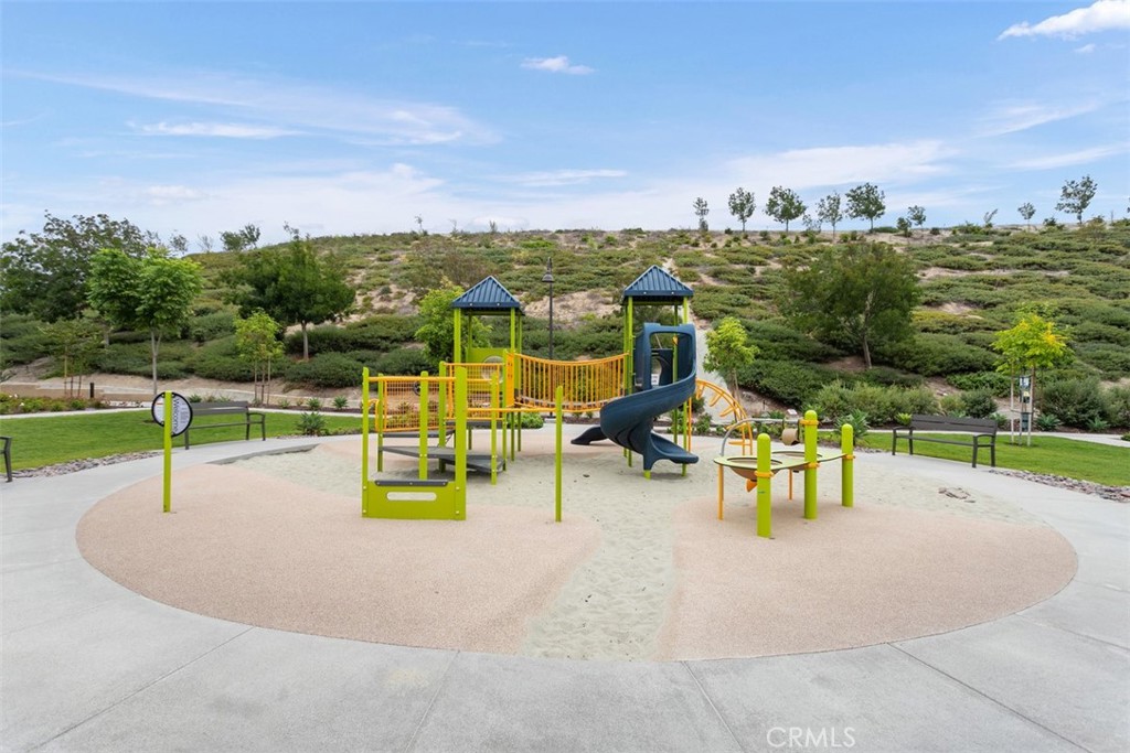 4366 Pacifica Way, Unit 7 Oceanside, CA 92056 - Photo 31 of 36 a view of a swimming pool with lawn chairs and couches
