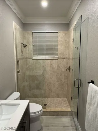 a bathroom with a sink and a toilet