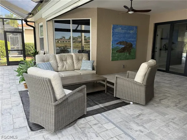 a outdoor living space with furniture and a window