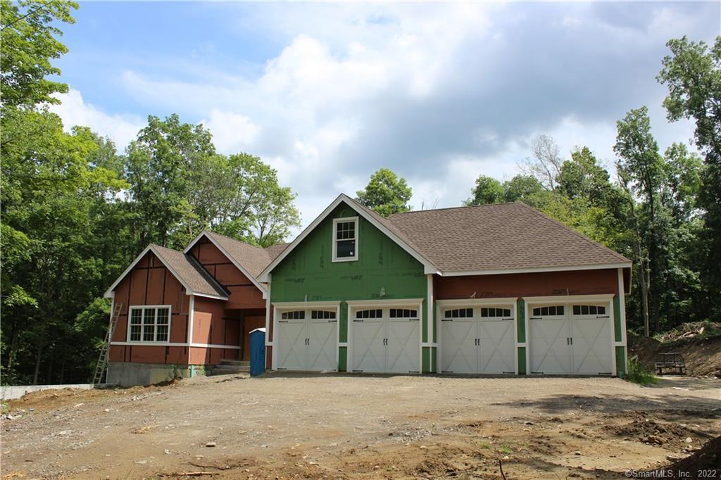 131 Still Hill Road Bethlehem, CT 06751 - Photo 1 of 1 a front view of a house with a garden