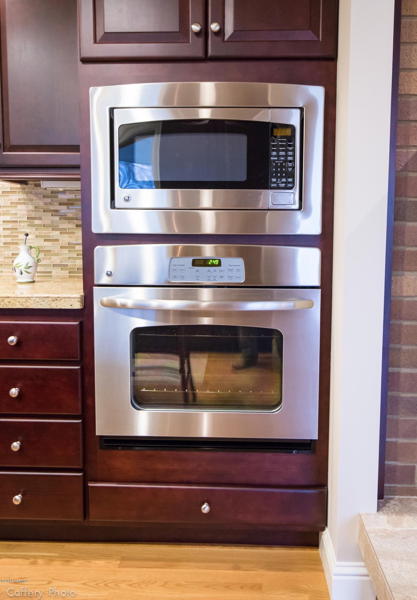 1271 Lateral B Road Wapato, WA 98951 - Photo 11 of 32 a stove top oven sitting inside of a kitchen