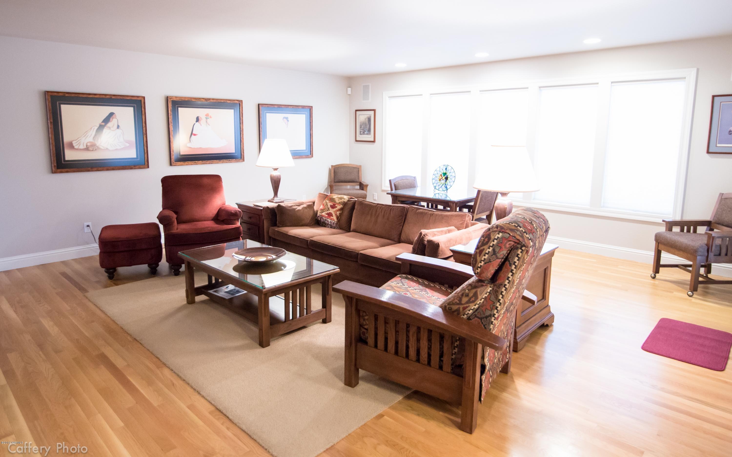 1271 Lateral B Road Wapato, WA 98951 - Photo 13 of 32 a living room with furniture and a large window