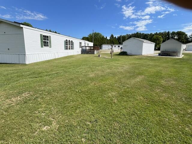7136 Tannery Road, Unit 19 Two Rivers, WI 54241 - Photo 3 of 21 Side