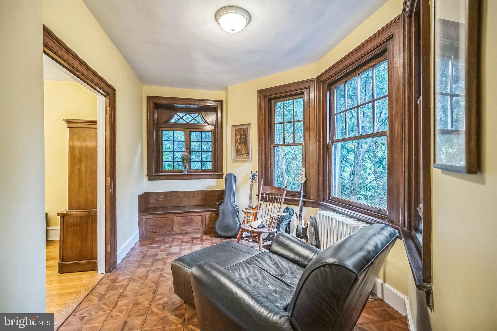 102 Maple Avenue Wyncote, PA 19095 - Photo 11 of 30 a living room with furniture and a window