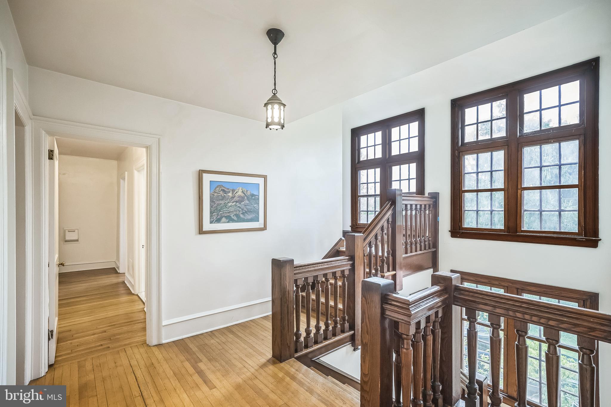 102 Maple Avenue Wyncote, PA 19095 - Photo 12 of 30 a view of a hallway with wooden floor and stairs