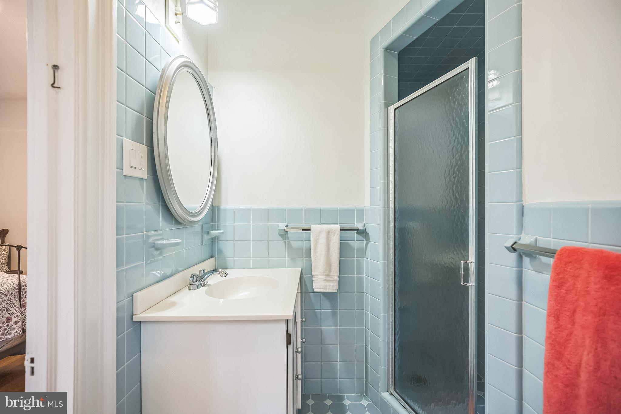 102 Maple Avenue Wyncote, PA 19095 - Photo 16 of 30 a bathroom with a sink vanity and a mirror