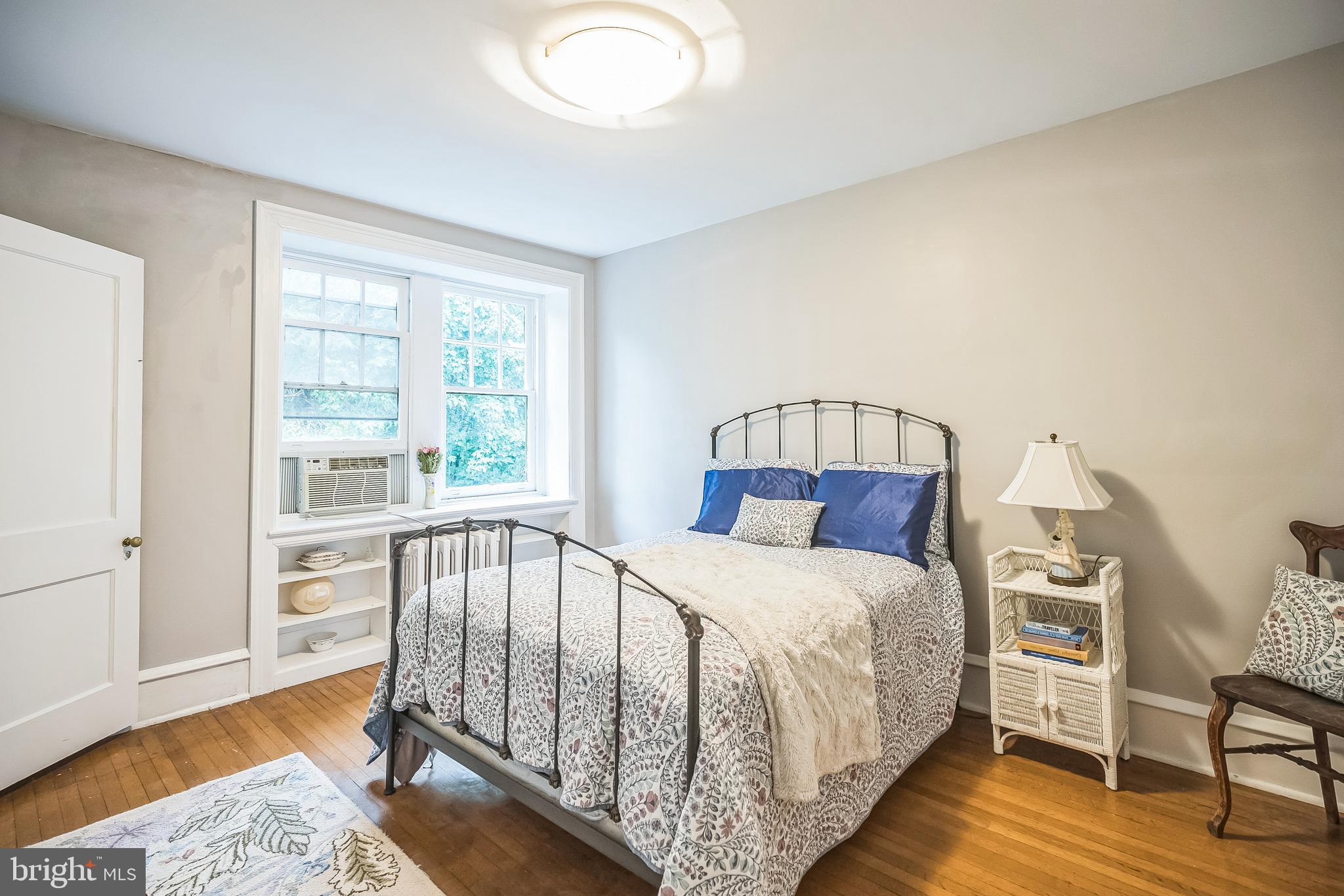 102 Maple Avenue Wyncote, PA 19095 - Photo 19 of 30 a large bed sitting in a bedroom next to a window