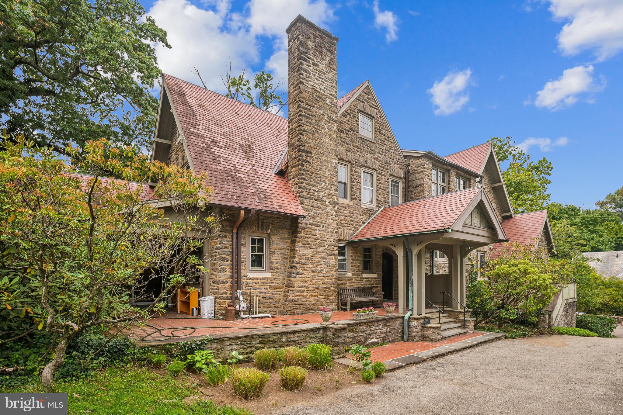 102 Maple Avenue Wyncote, PA 19095 - Photo 2 of 30 a front view of a house with garden and plants