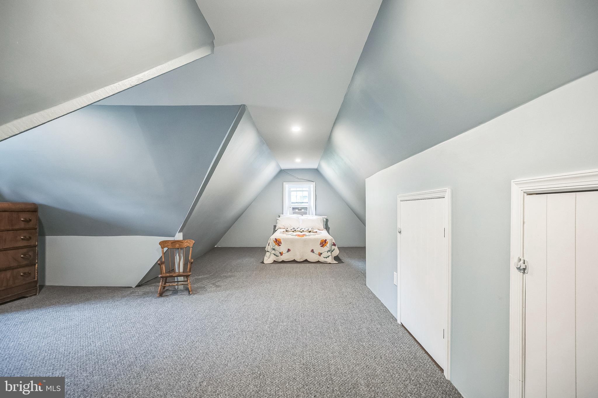 102 Maple Avenue Wyncote, PA 19095 - Photo 26 of 30 a hallway with stairs and a couch
