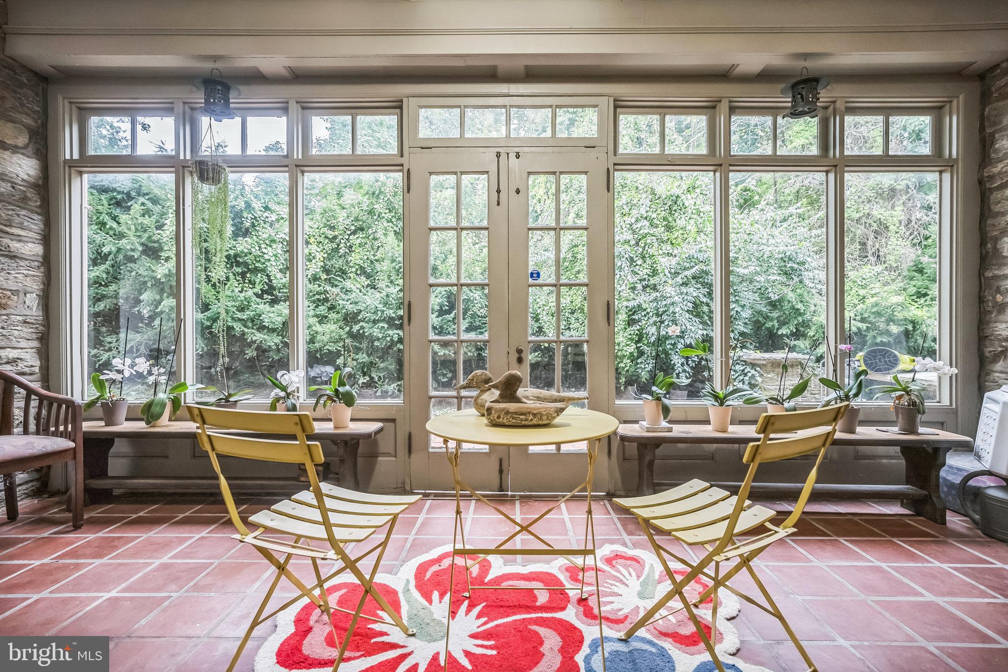 102 Maple Avenue Wyncote, PA 19095 - Photo 28 of 30 a living room with furniture and floor to ceiling windows