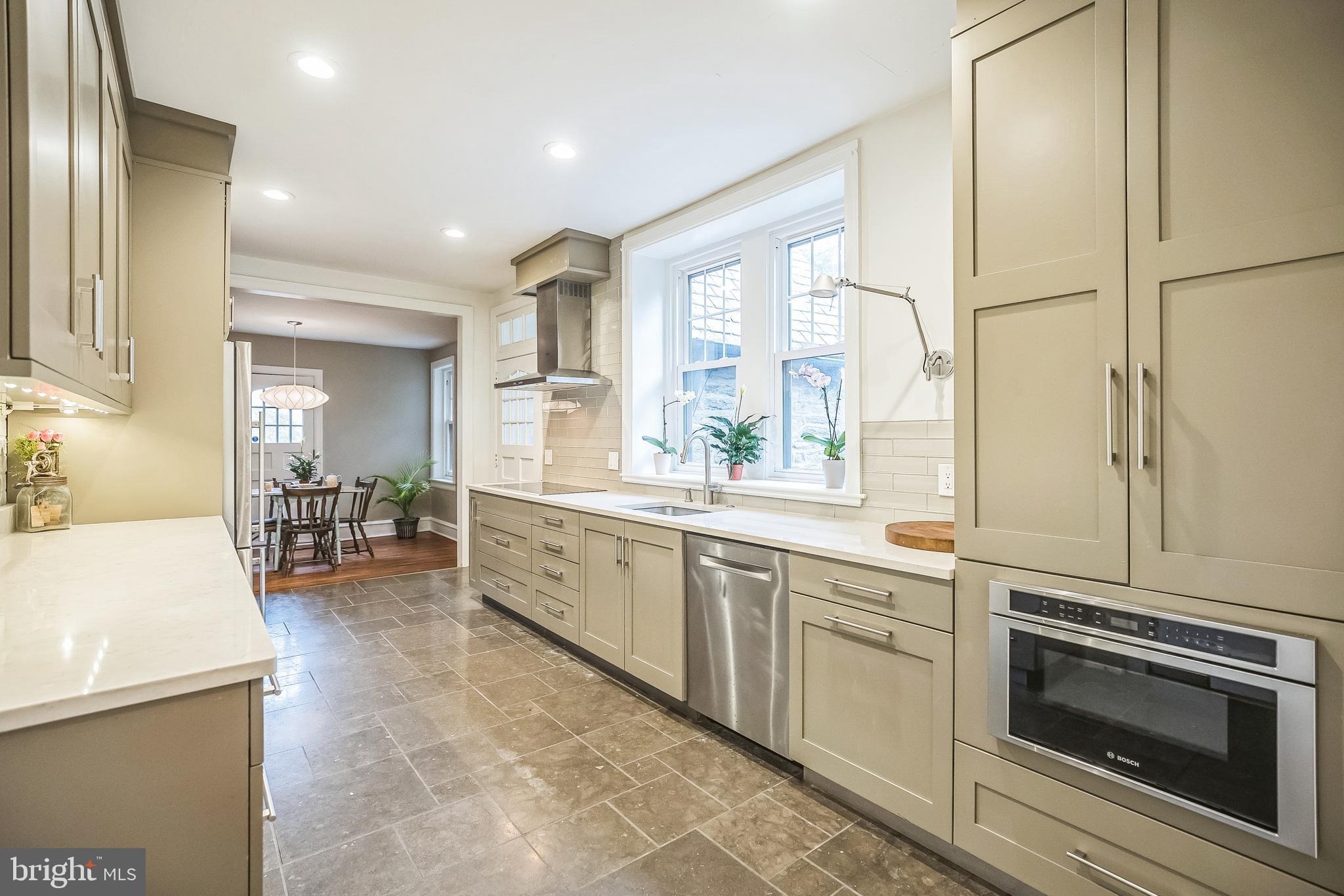 102 Maple Avenue Wyncote, PA 19095 - Photo 8 of 30 a large white kitchen with a large window
