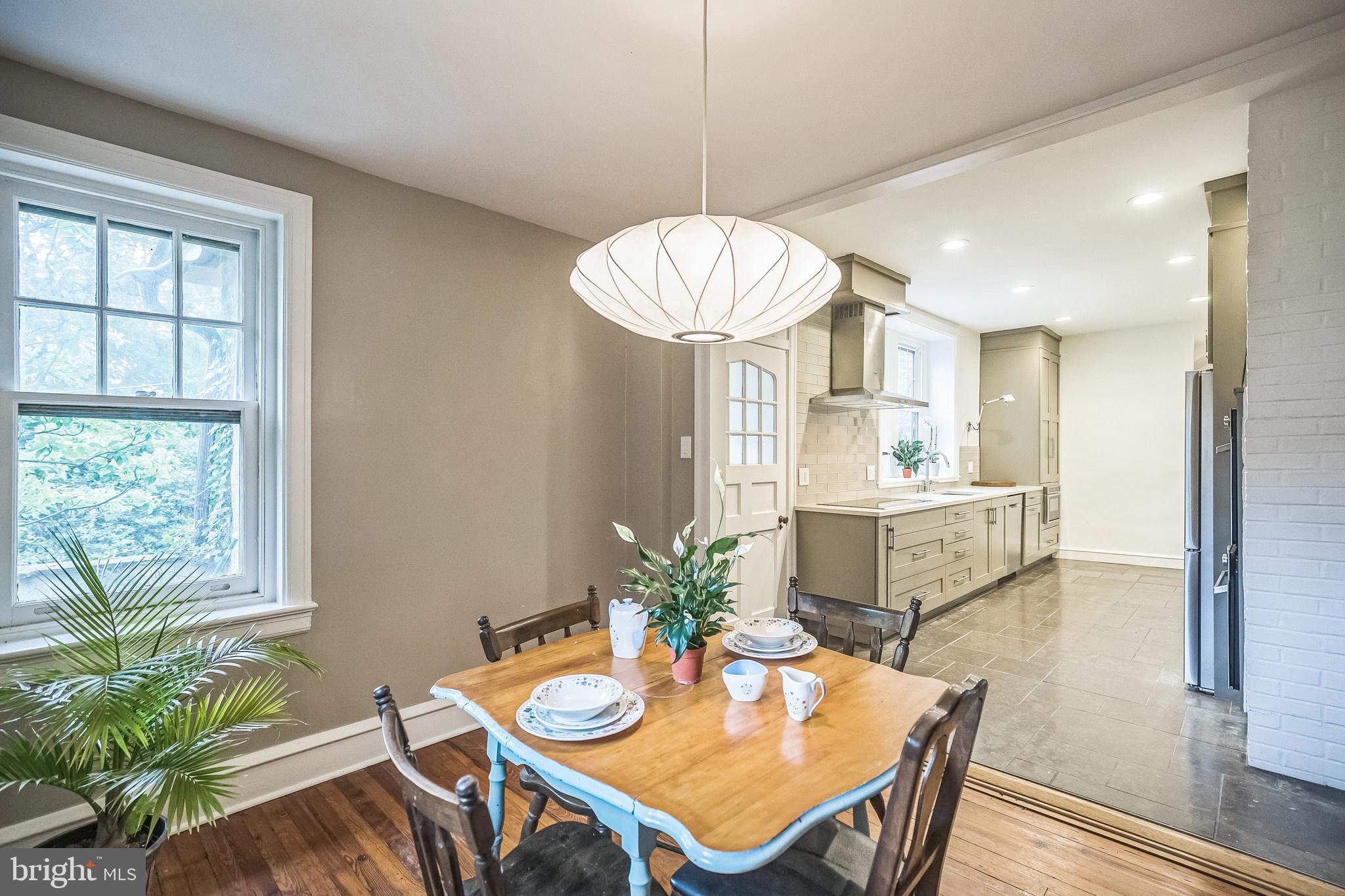 102 Maple Avenue Wyncote, PA 19095 - Photo 9 of 30 a view of a dining room with furniture window and wooden floor