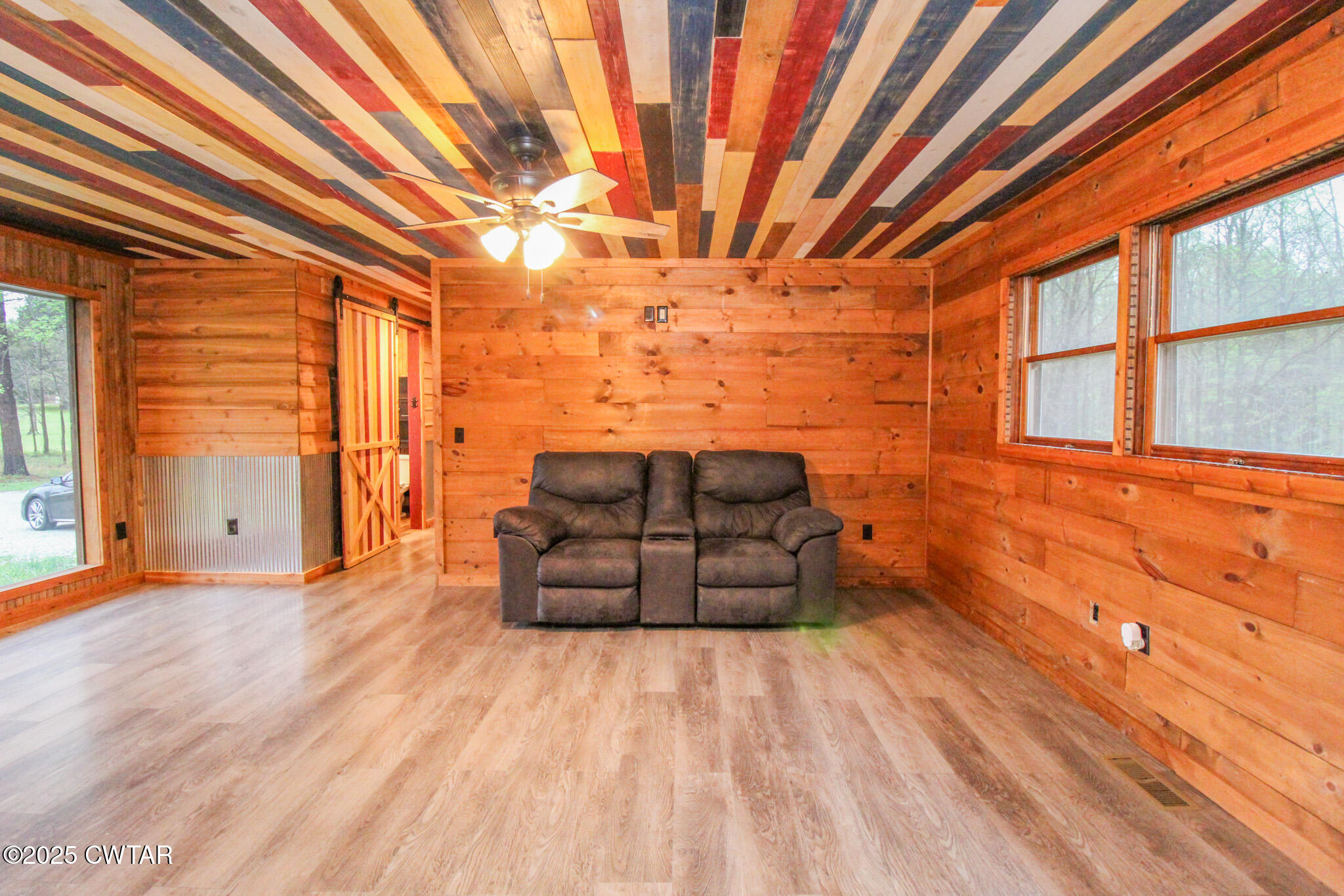 326 Fancy Road Dresden, TN 38225 - Photo 18 of 45 a view of room with window and wooden floor