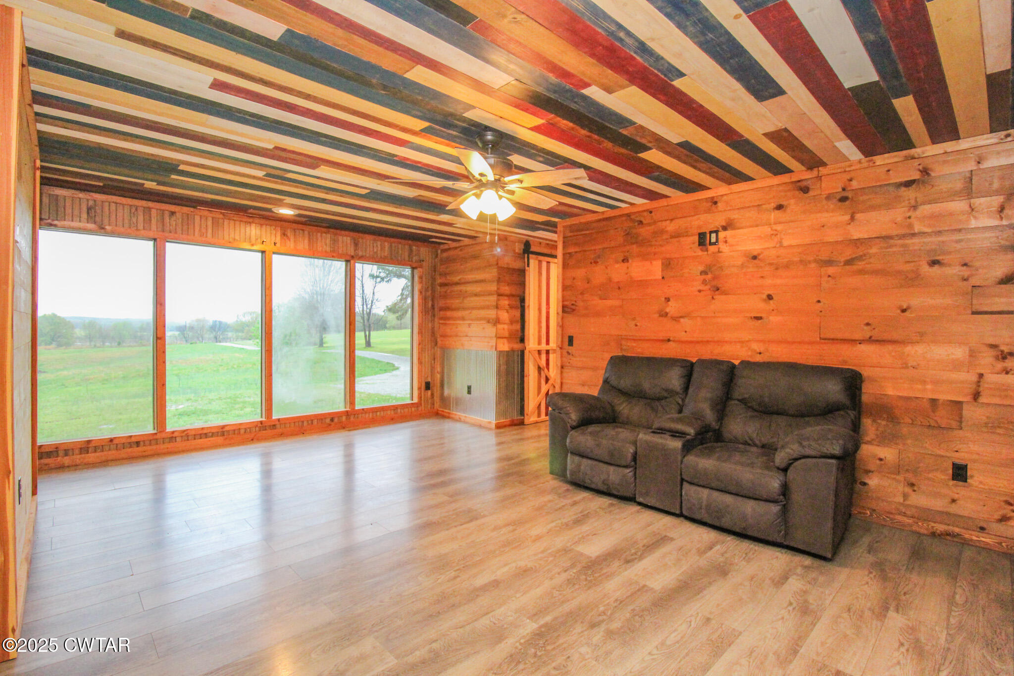 326 Fancy Road Dresden, TN 38225 - Photo 21 of 45 a living room with furniture and a large window