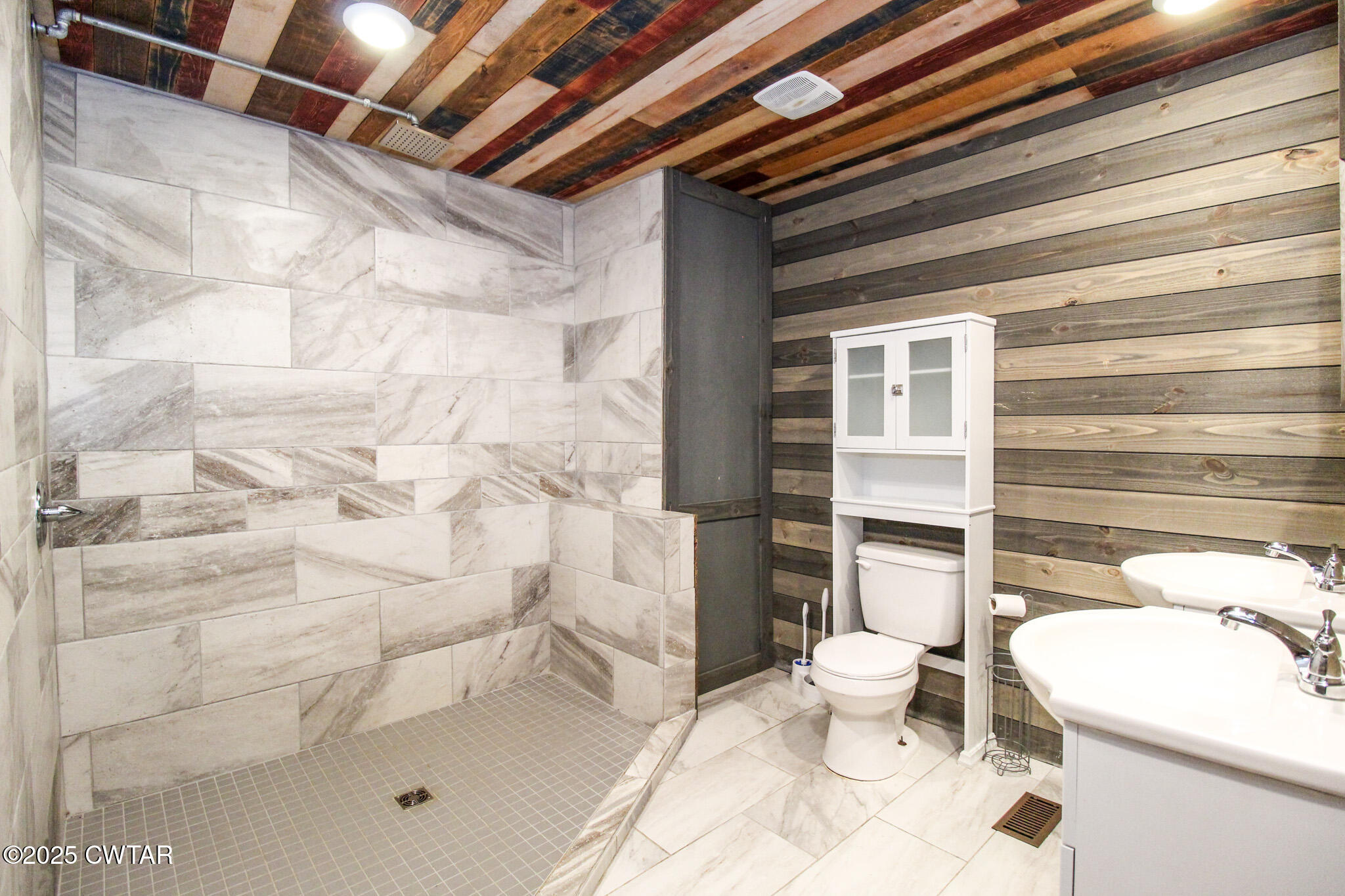 326 Fancy Road Dresden, TN 38225 - Photo 27 of 45 a bathroom with a toilet and a shower
