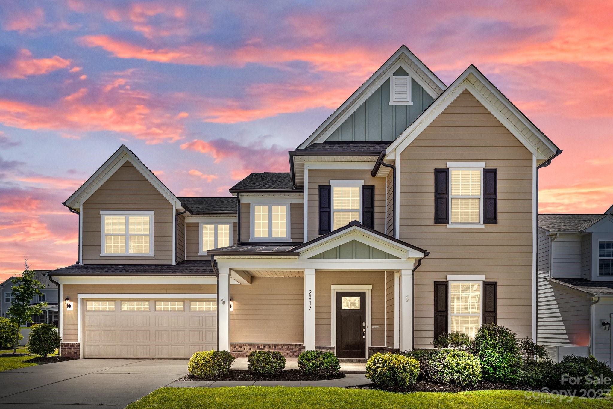 2017 Sugaree Commons Fort Mill, SC 29715 - Photo 1 of 48 a front view of a house with garden