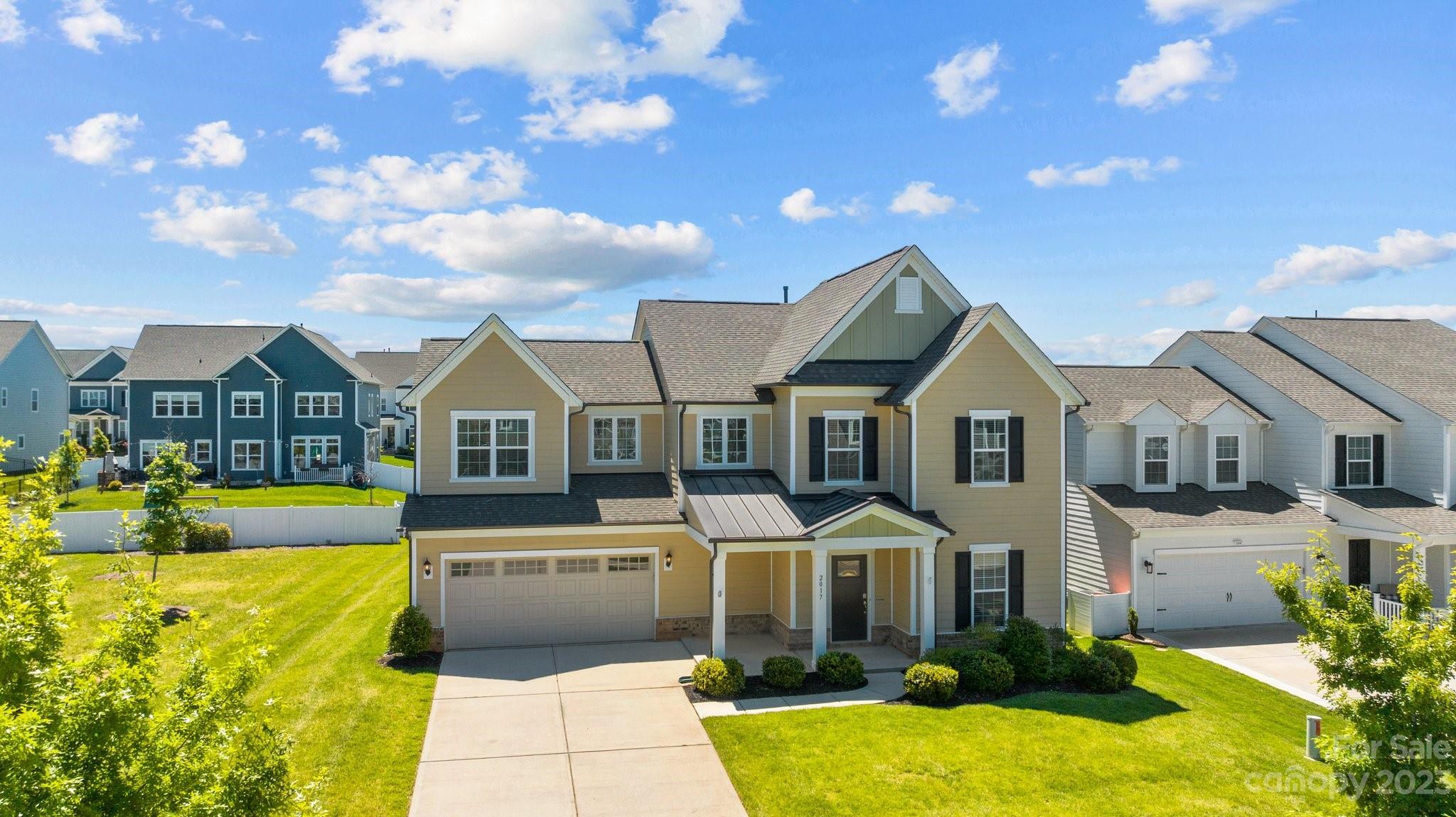 2017 Sugaree Commons Fort Mill, SC 29715 - Photo 5 of 48 a front view of a house with swimming pool