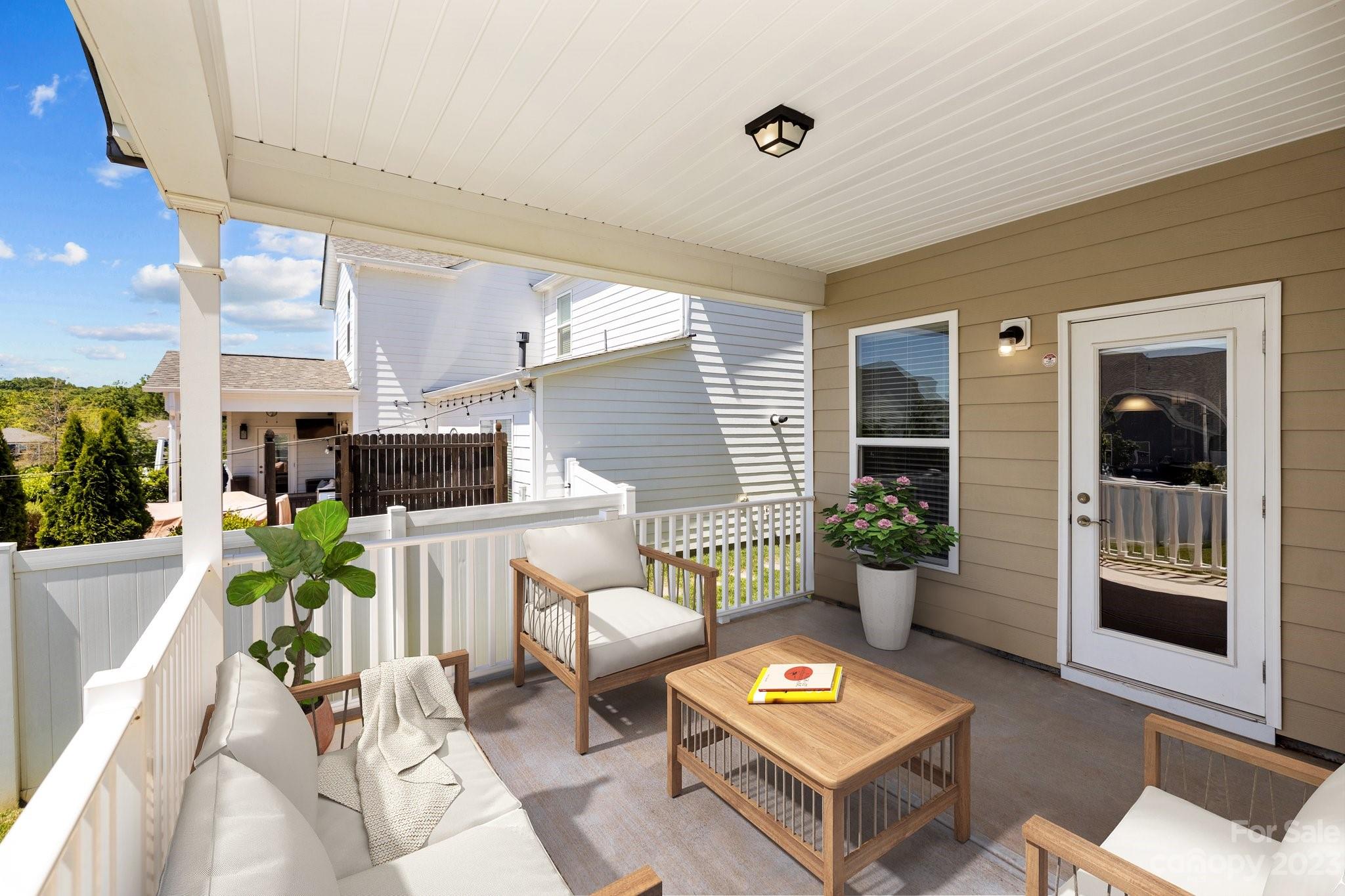 2017 Sugaree Commons Fort Mill, SC 29715 - Photo 9 of 48 a living room with furniture a window and a flat screen tv