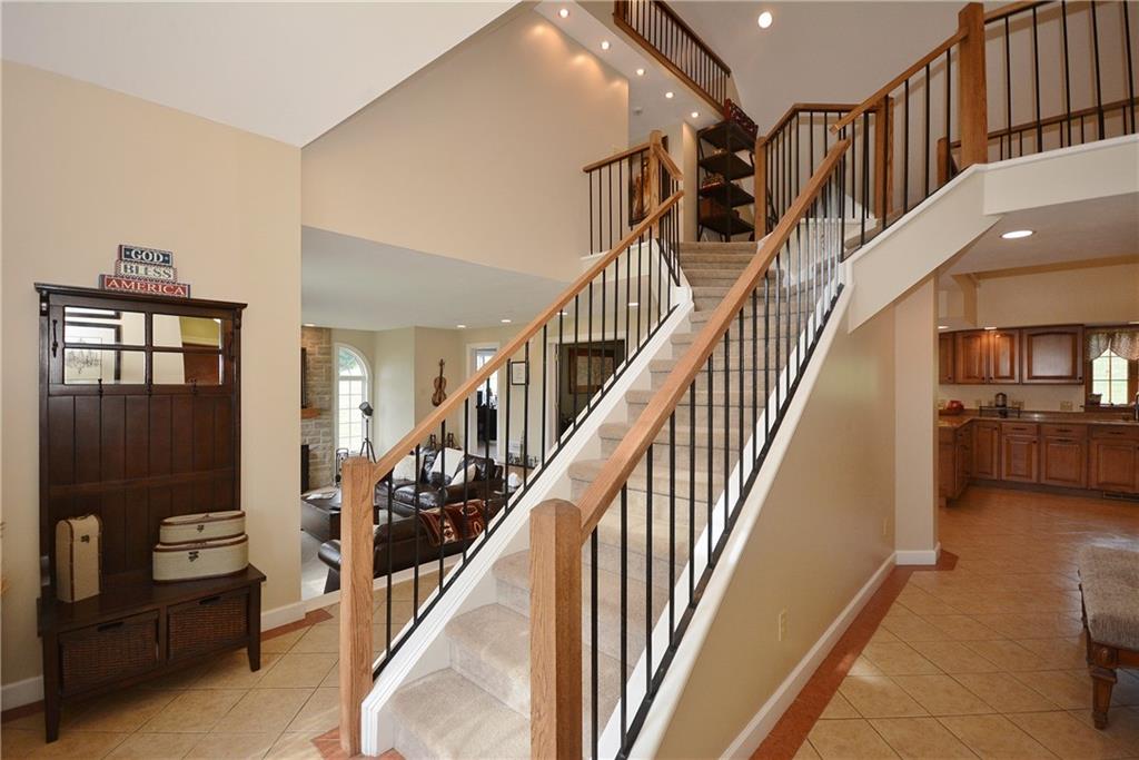 92 Chestnut Ridge Road Washington, PA 15301 - Photo 3 of 25 The split staircase and open entry provides an immediate impression of this home's flow and spacious floor plan.