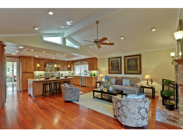 21841 McClellan Road Cupertino, CA 95014 - Photo 12 of 25 a living room with furniture and a large window