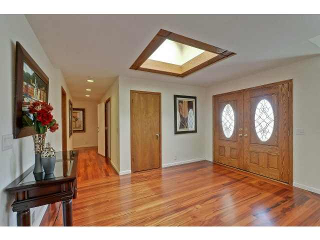21841 McClellan Road Cupertino, CA 95014 - Photo 2 of 25 a view of empty room with wooden floor