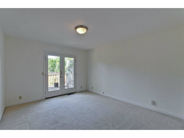 21841 McClellan Road Cupertino, CA 95014 - Photo 21 of 25 a view of an empty room with a window